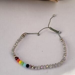 Vintage rainbow beaded bracelet adjustable cord boho 2000s pride style